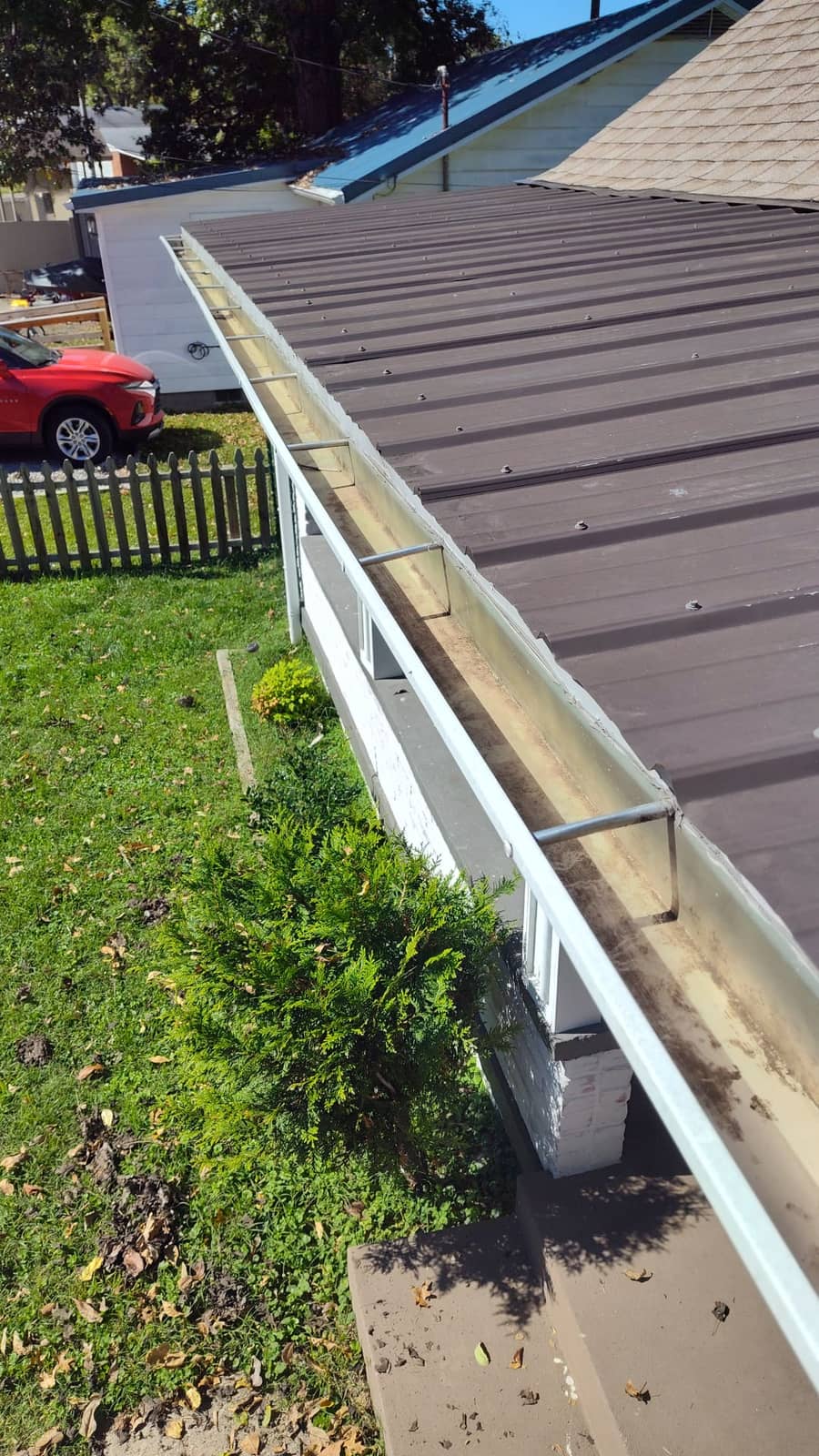 Clean, debris-free residential gutter after professional gutter cleaning by Elite Exteriors