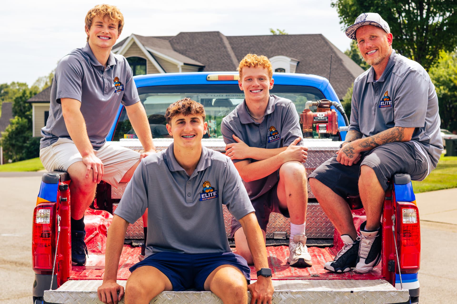 Elite Exteriors team with company truck
