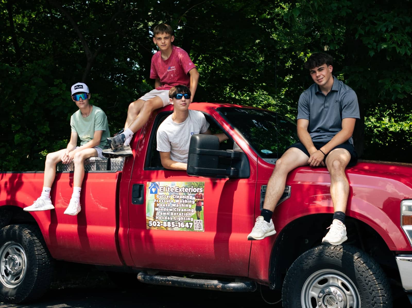 Elite Exteriors team with company truck